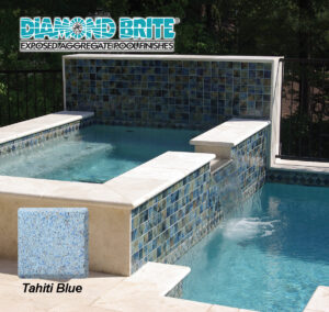 Spa with Tahiti Blue exposed aggregate finish, multi-colored blue tile accents on high back wall, inside wall and accent wall attached to a pool. Diamond Brite logo in upper left of image and Tahiti Blue product tile in lower left of image